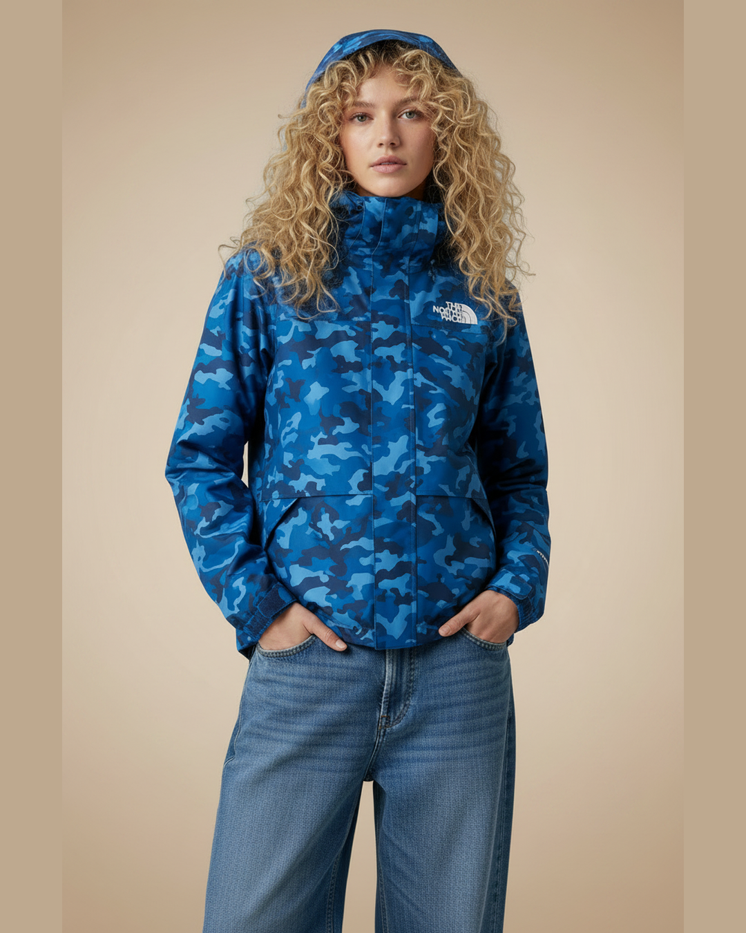 TNF Bear Hoodie Jacket with hood up and blue wide leg jeans