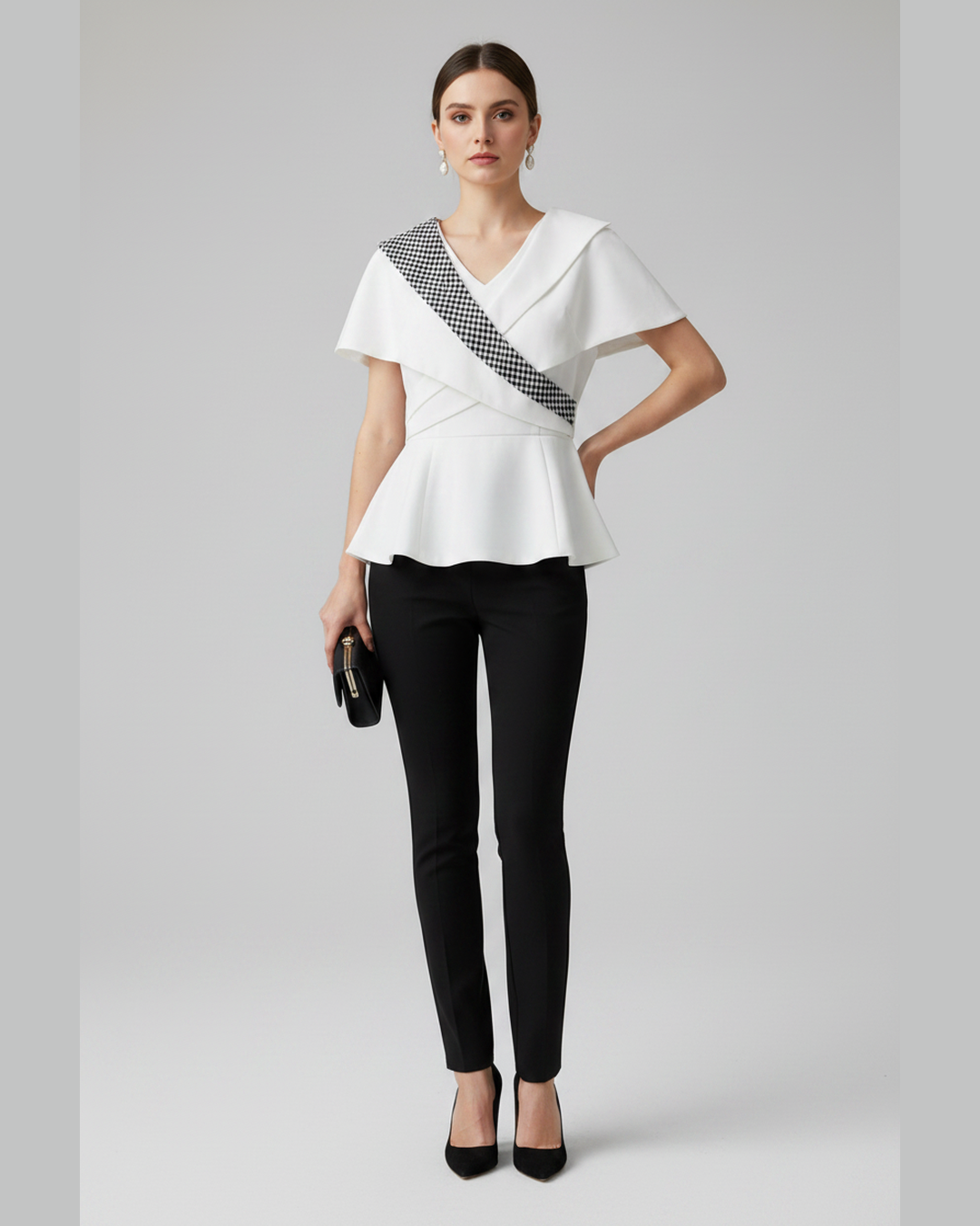 Diagonal Chess Blouse full body with black trousers, pointed heels and black clutch